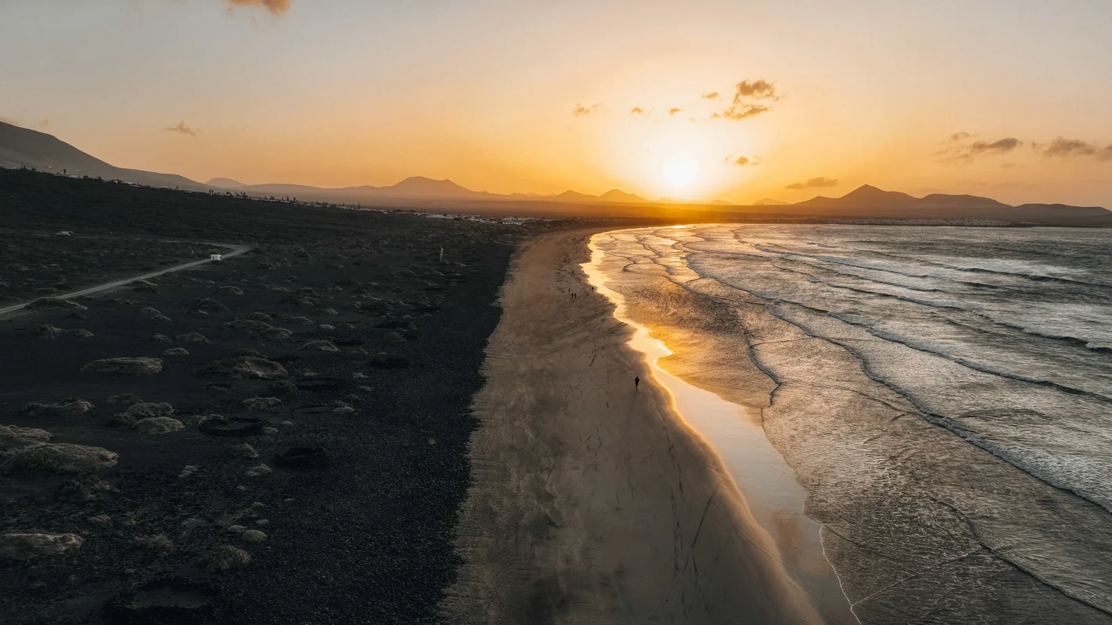 Sunset over Famara beach.